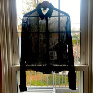 Aspesi sheer, sexy black button down crepe shirt. Slightly curvey hem.